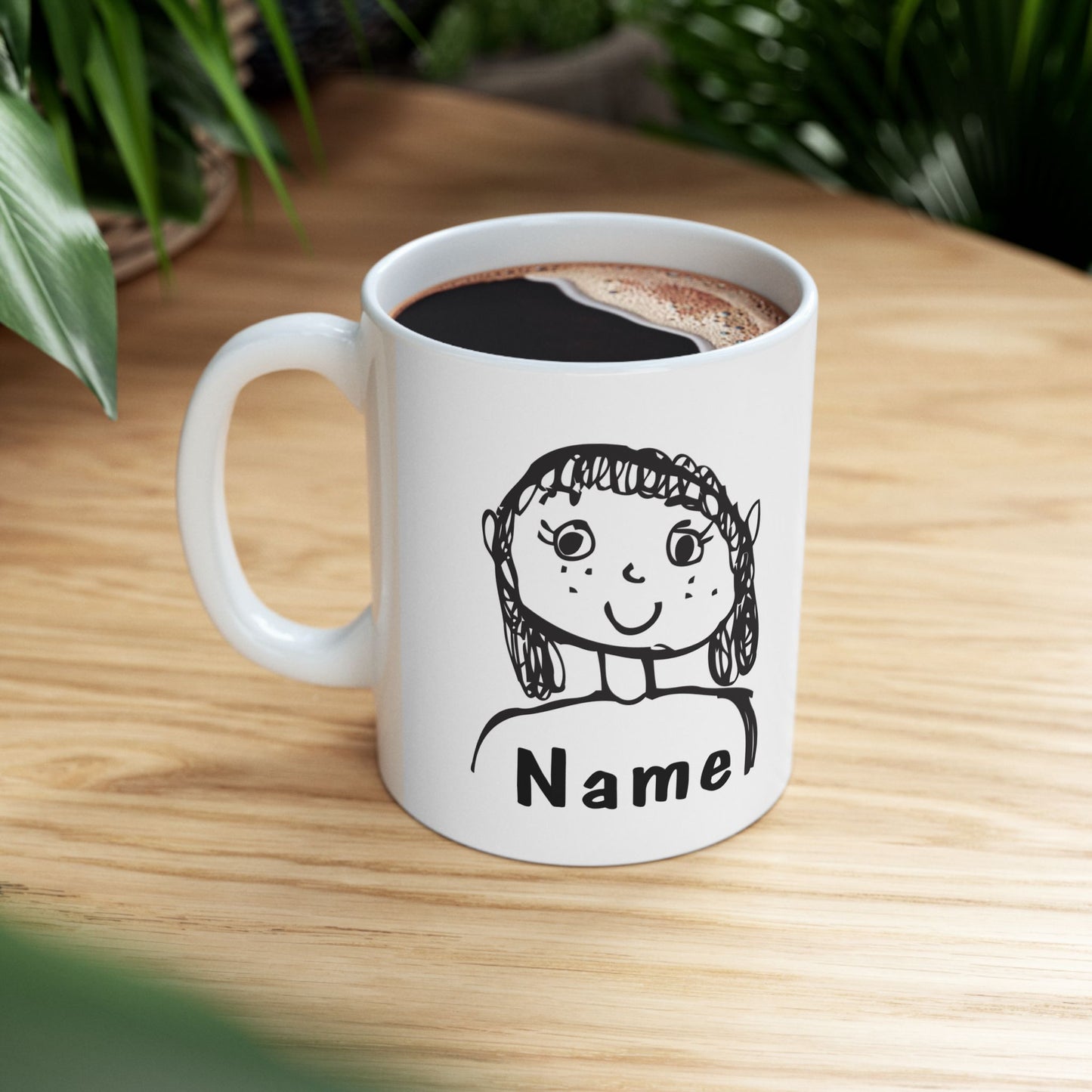 Personalize an 11oz ceramic mug with your child's drawing—featured on their class t-shirt