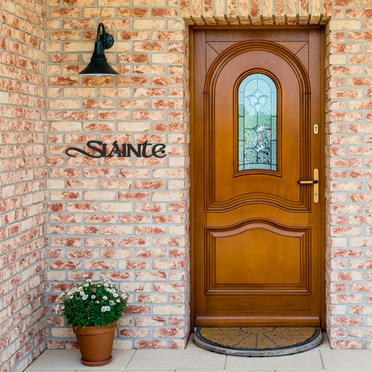 Slainte_Metal_Bar_Sign_Cheers_to_Good_H_Black_Brick_Entrance_Mockup.png